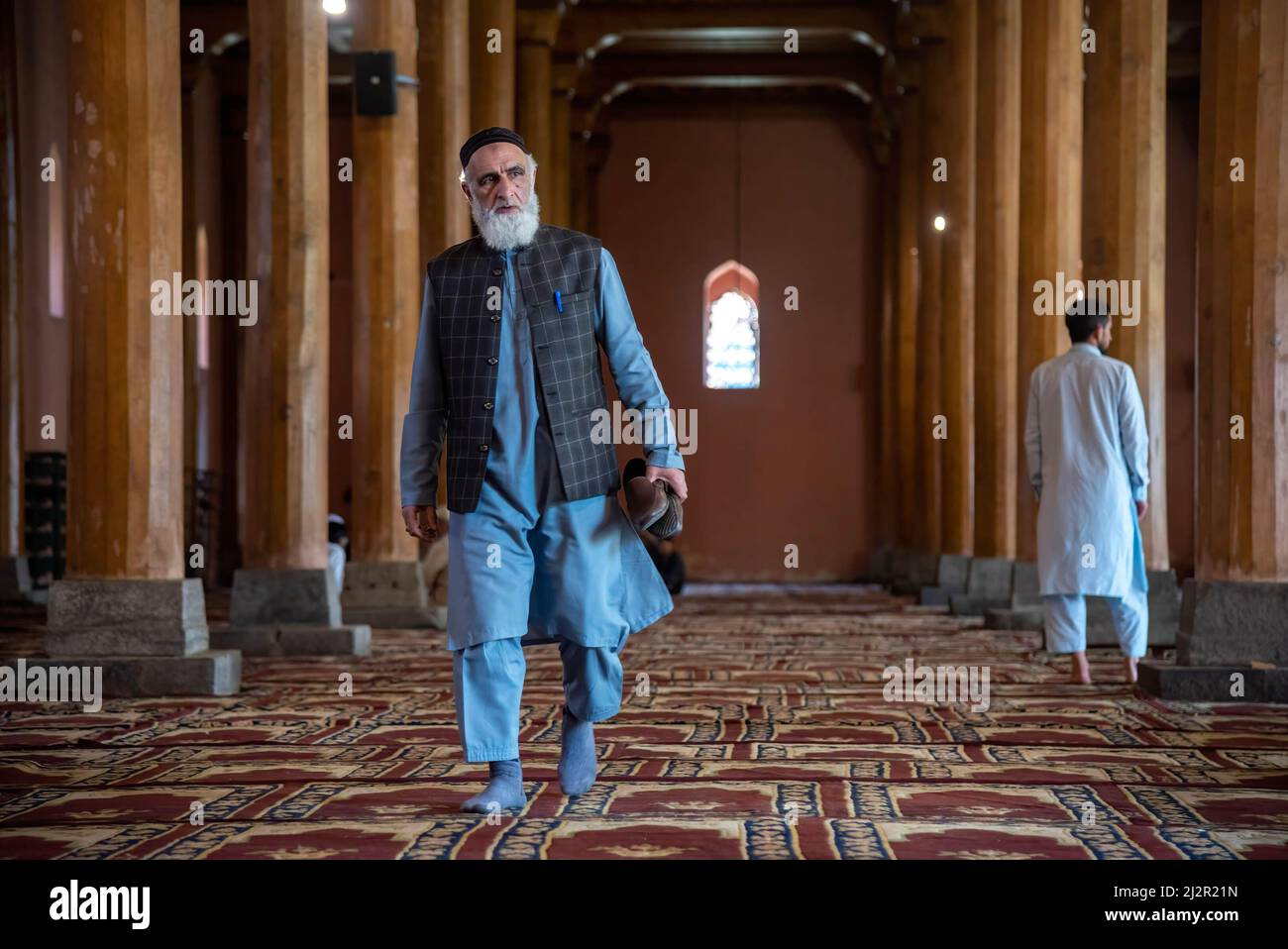 A Kashmiri muslim man walks inside Jamia Masjid after praying on the ...