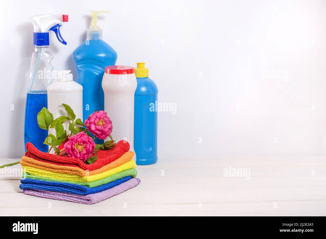 The concept of cleaning the house, in the apartment - home cleaning products on a white background with copy space, prevention of viral diseases. Stock Photo
