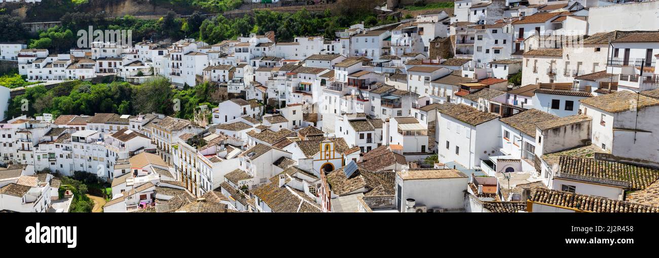 Rooftop view of the white village of dug into the mountain caves in