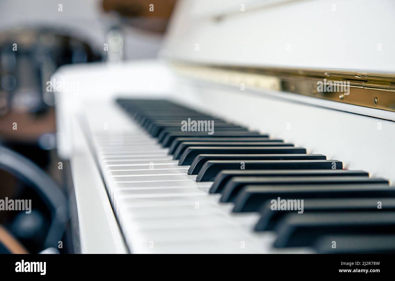 Close-up of white piano keys, musical background Stock Photo - Alamy