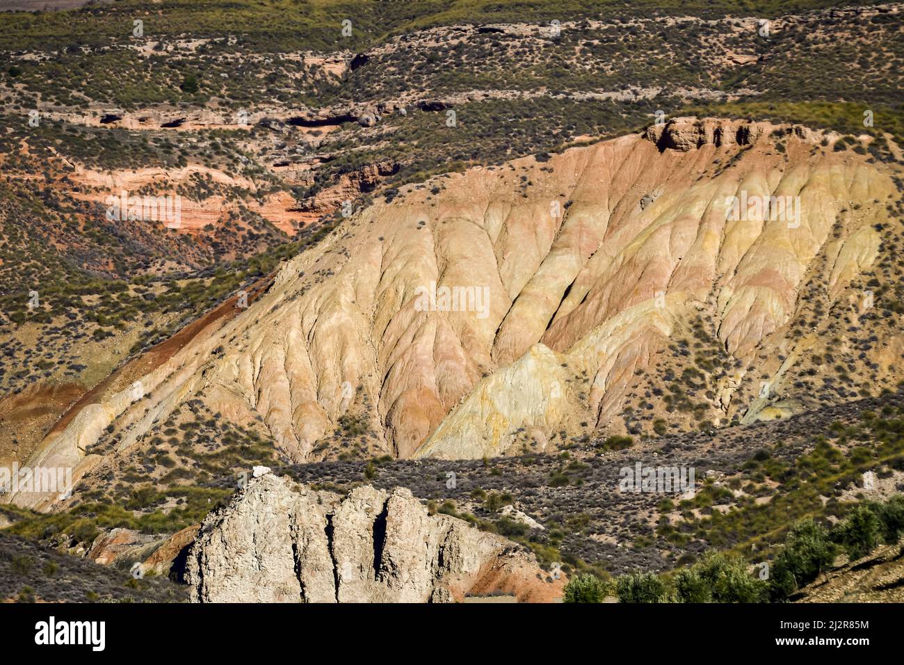 Badland, red lands without vegetation of the Granada Geopark. Stock Photo