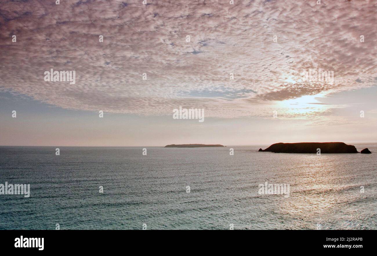 Beautiful late summer sunset, view of Irish sea, Gateholm and Skokholm Island, Marloes Sands (National Trust) Pembrokeshire Coast National Park Wales Stock Photo