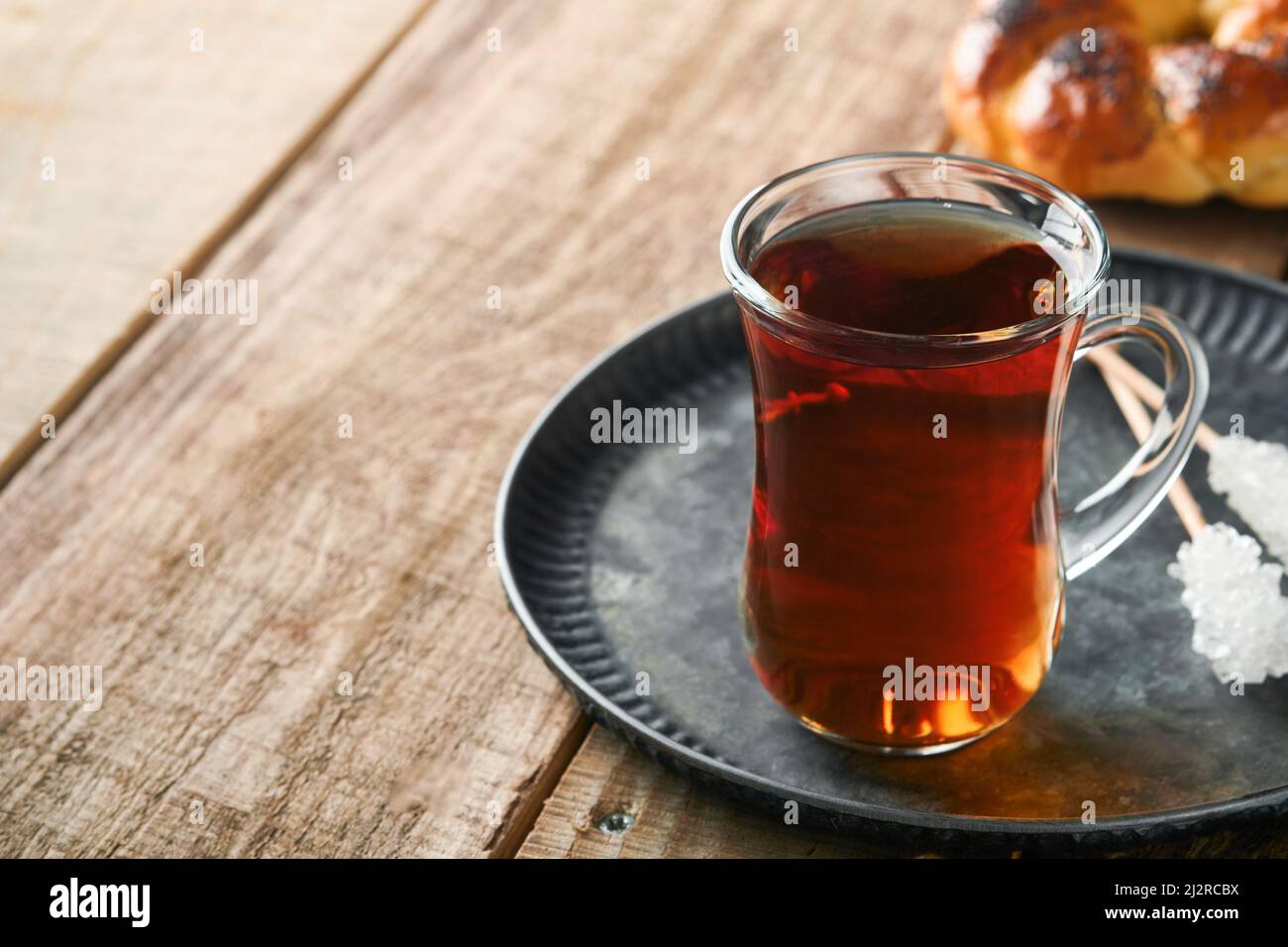 Turkish black tea. Glass cup of turkish black tea and crispy Turkish