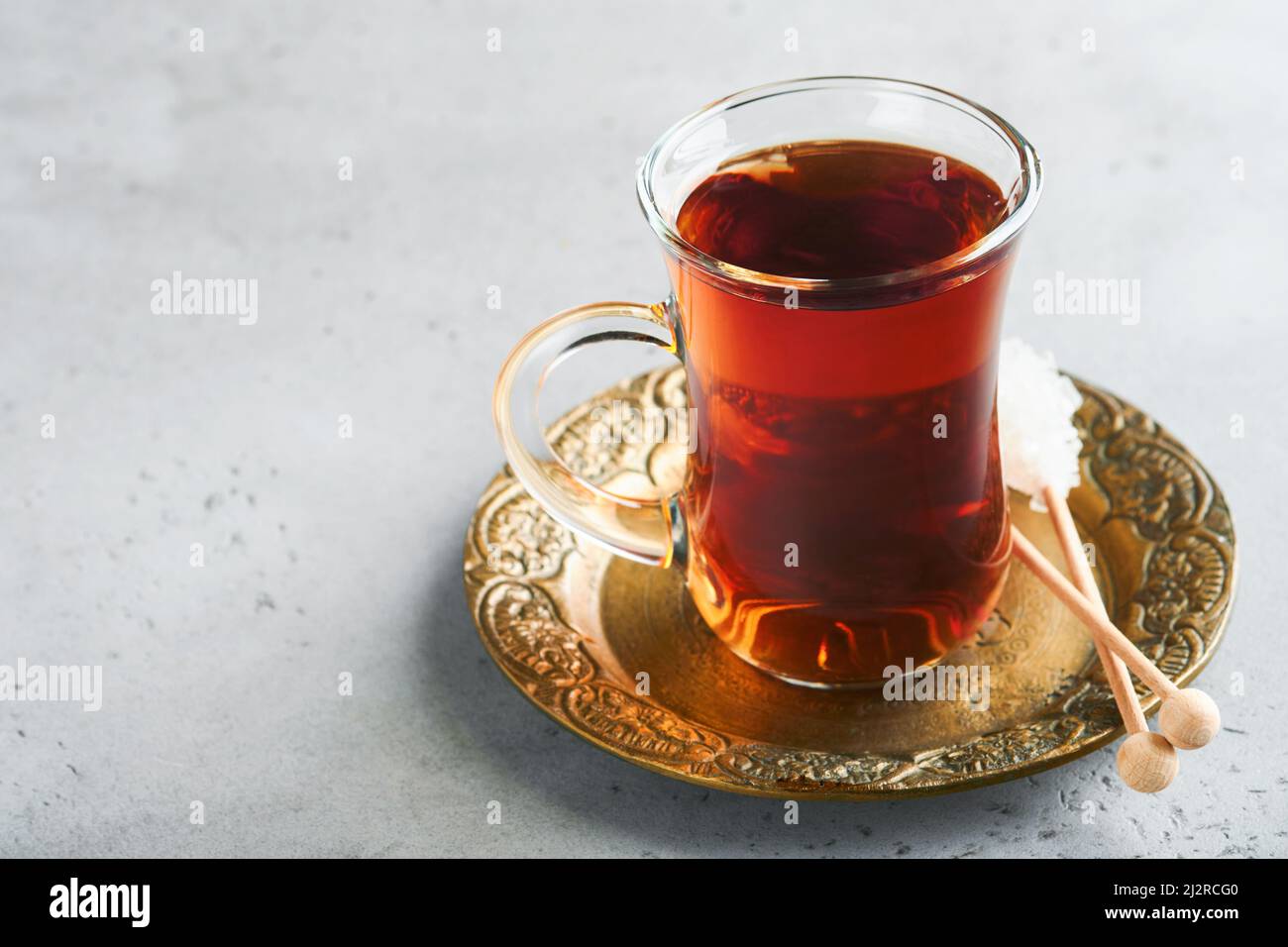 Turkish black tea. Glass cup of turkish black tea and crispy Turkish