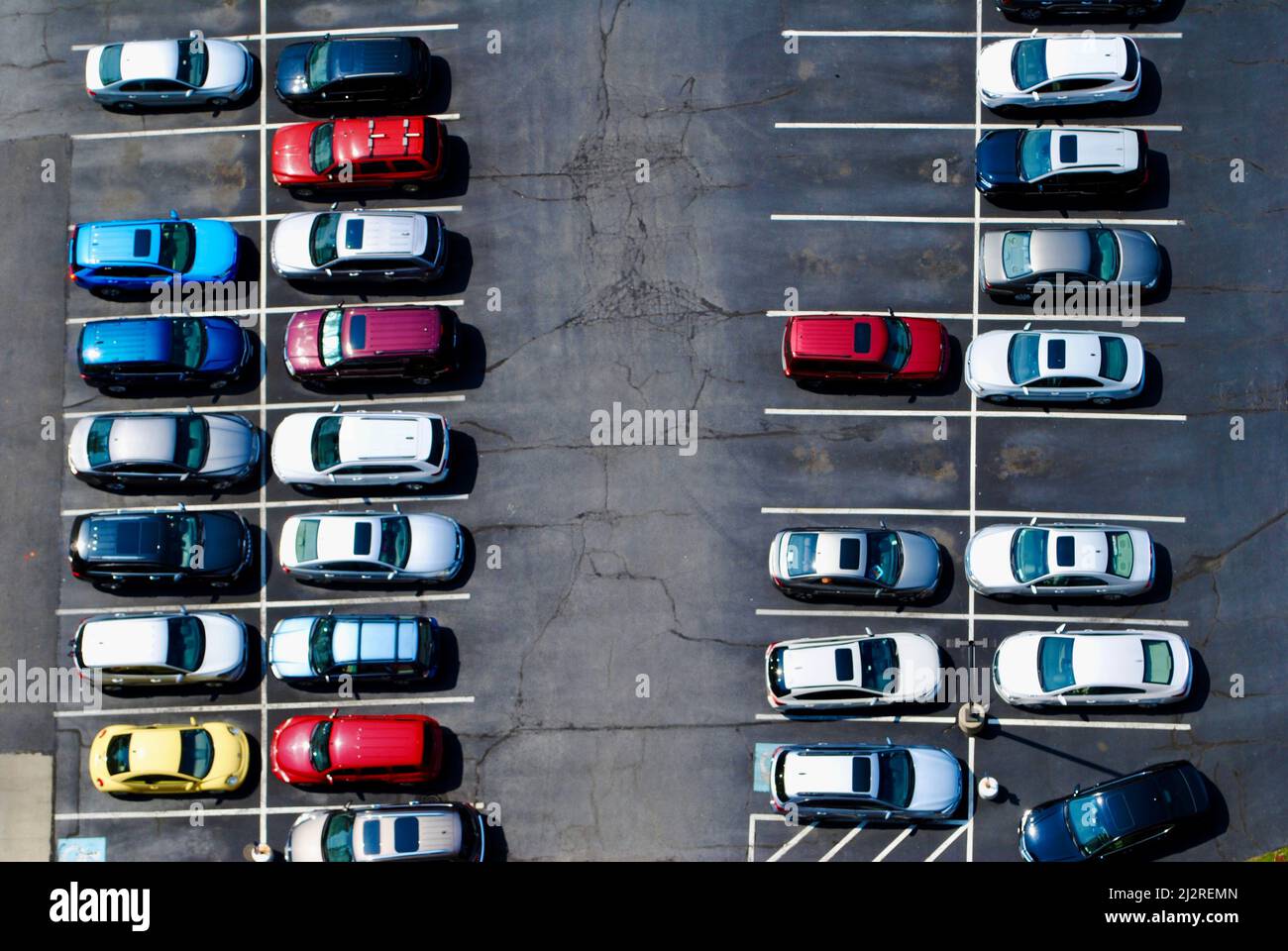 Arial view of cars in parking lot of a condominium building in Lakewood