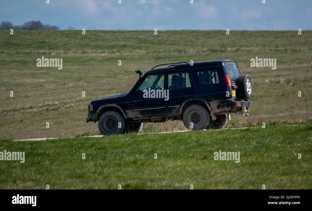 land rover 4x4 off road vehicle driving along a stone track Stock Photo ...