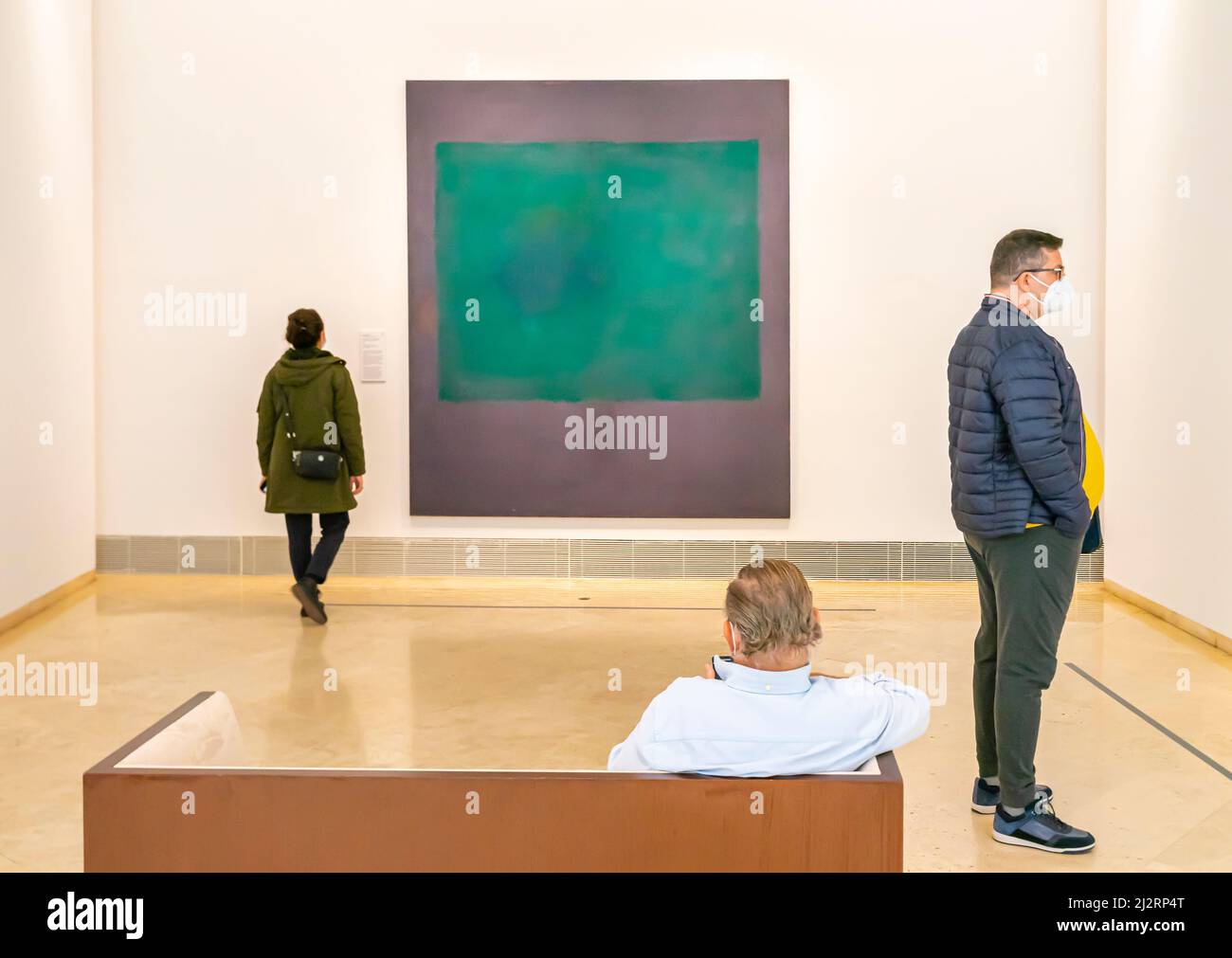 Visitors in American art room looking at Mark Rothko painting, Thyssen museum, Madrid Stock Photo
