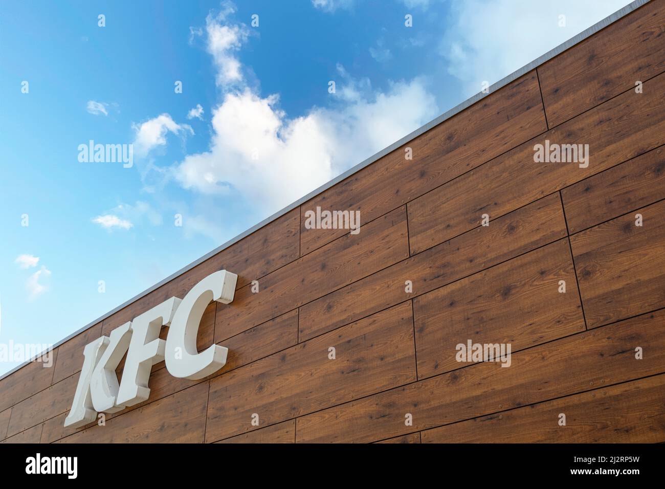 Porto, Portugal. March 2022.  the sign of the KFC, Kentucky Fried Chicken brand, in the city center Stock Photo