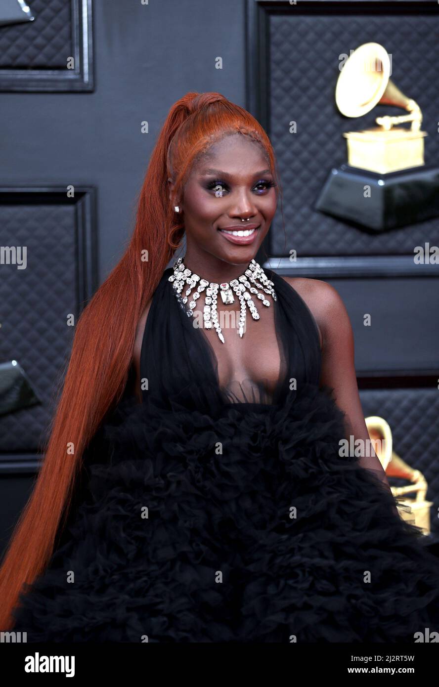 Doechii poses on the red carpet at the 64th Annual Grammy Awards at the