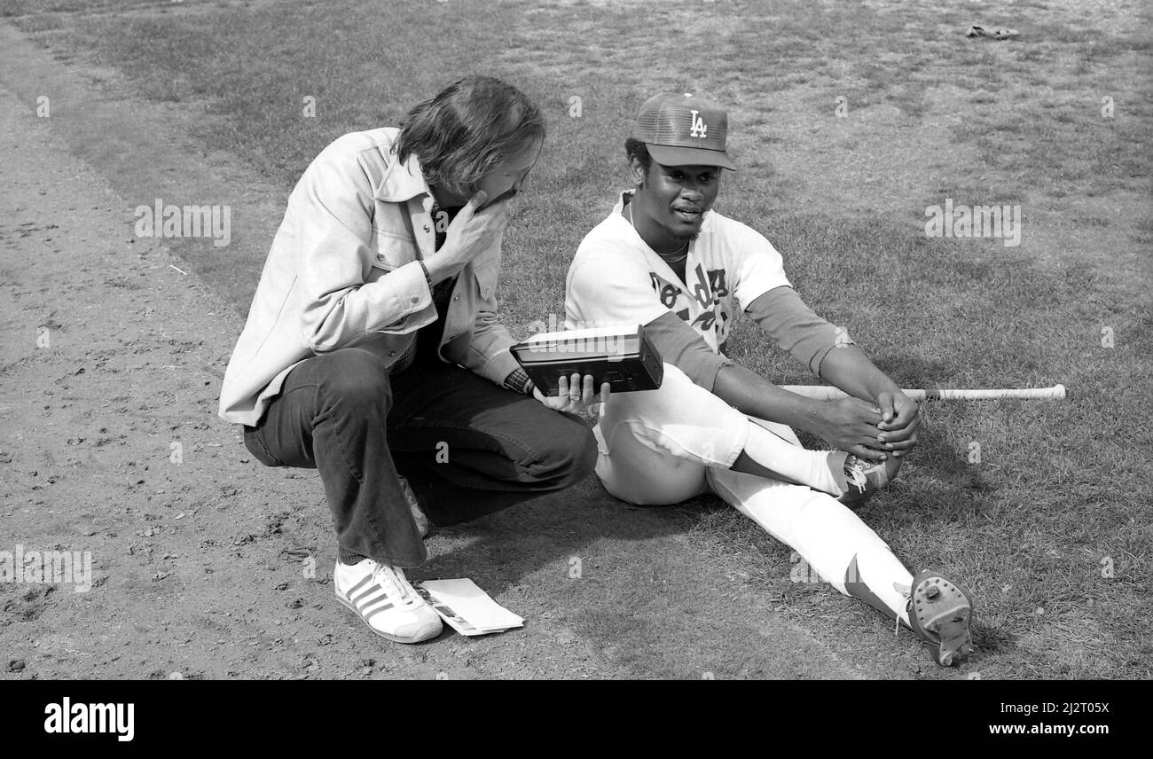 Journalist  interviewing a young Dodger player hopeful at a pre-season workout at Dodger Stadium. Stock Photo