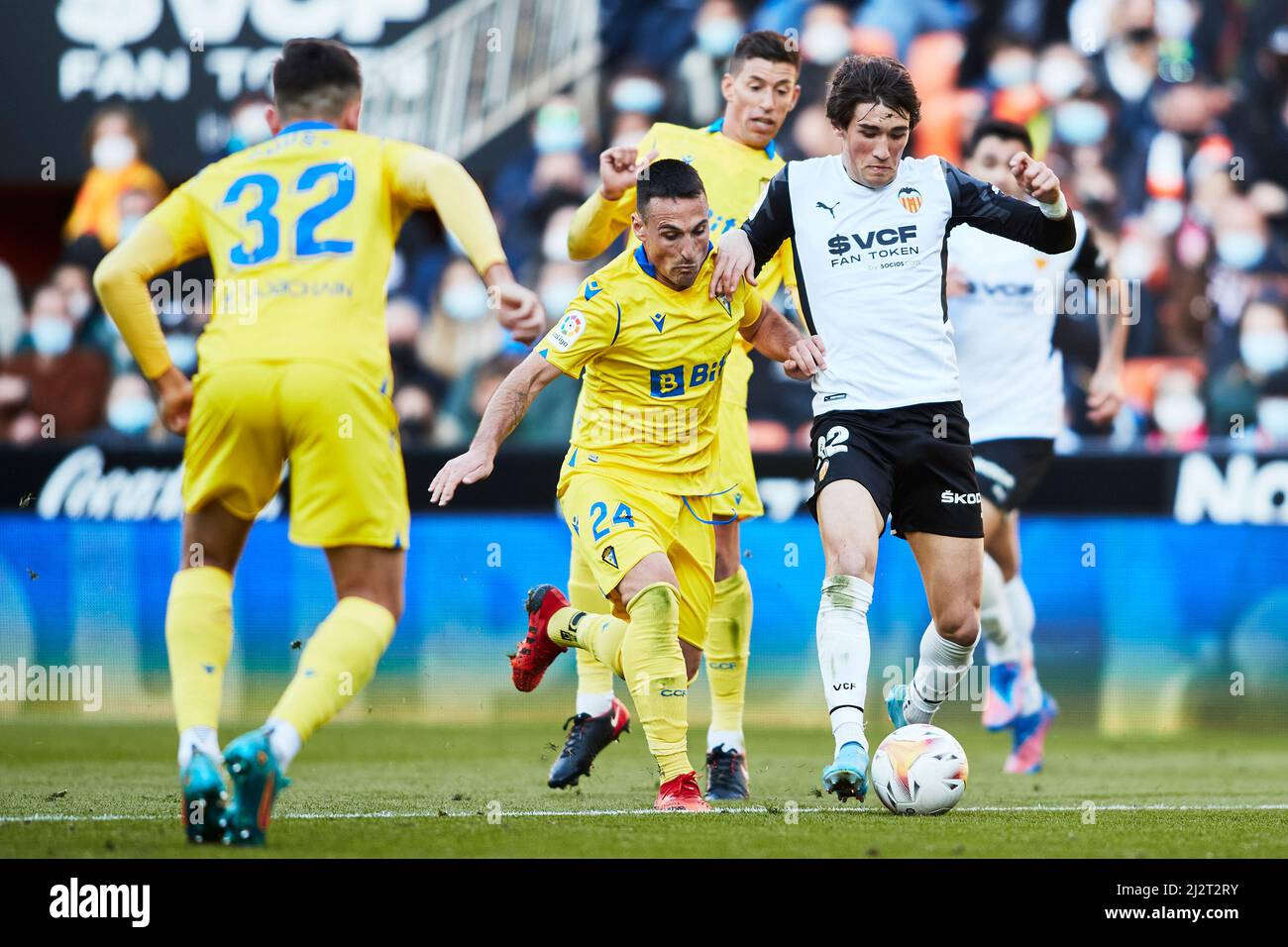 03 April 2022; Mestalla Stadium, Valencia, Spain; La Liga football, Valencia CF versus Cadiz CF; Jesus Vazquez Alcalde of Valencia CF annd Filip Malba Stock Photo