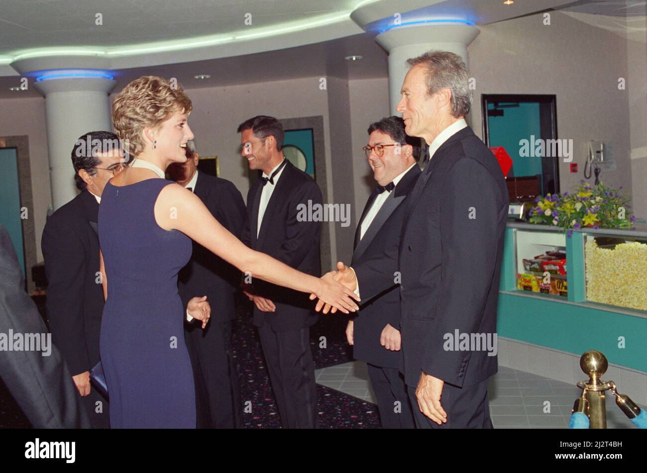 HRH The Princess of Wales, Princess Diana, at the new Warner West End Cinema in Leicester Square London,for the premiere of The Fugitive.  Pictured here shaking hands with Clint Eastwood.  Picture taken 23rd September 1993 Stock Photo