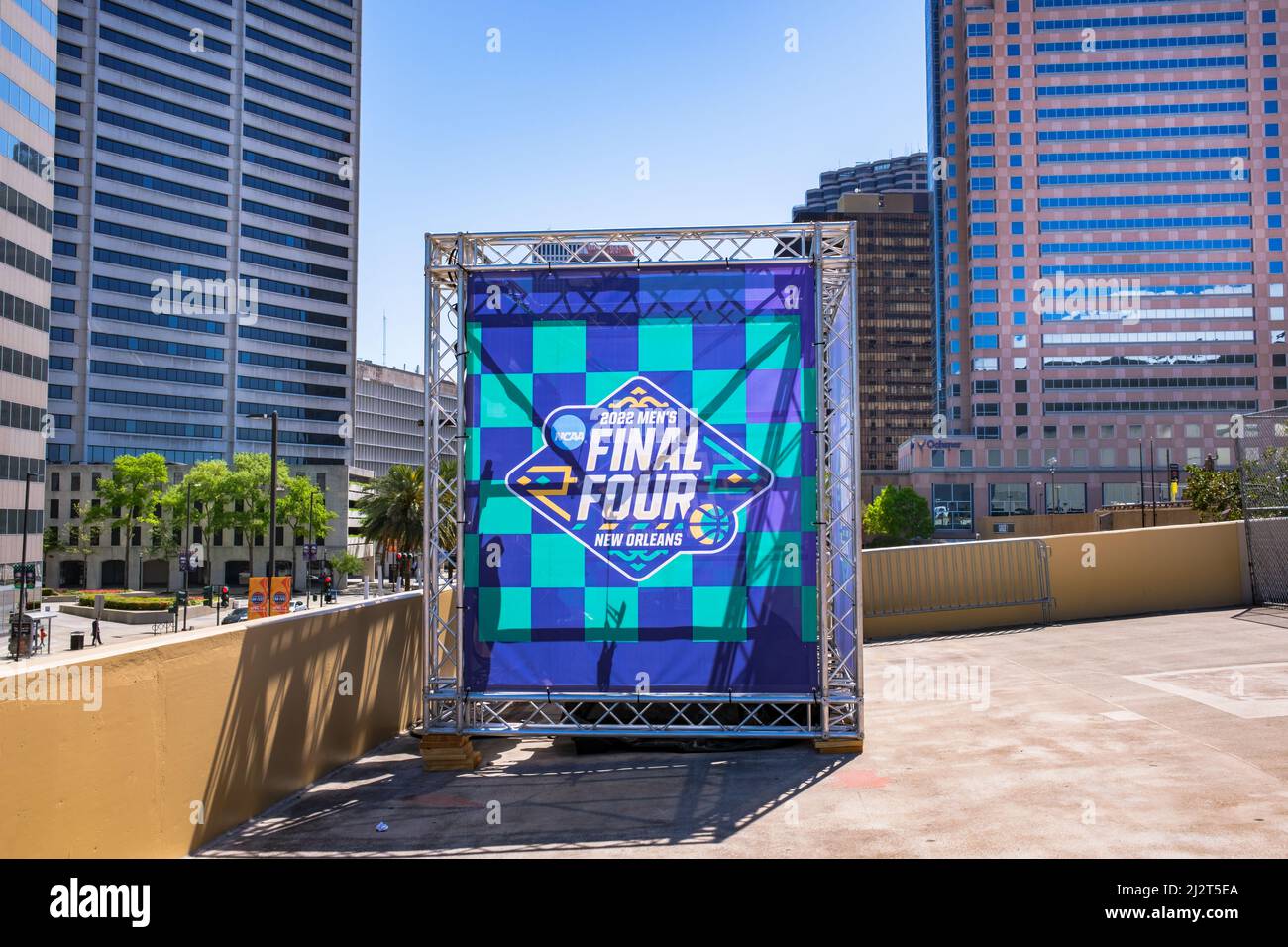 NEW ORLEANS, LA, USA - APRIL 3, 2022: NCAA 2022 Men's Final Four Sign in front of the Superdome in the Central Business District with office buildings Stock Photo