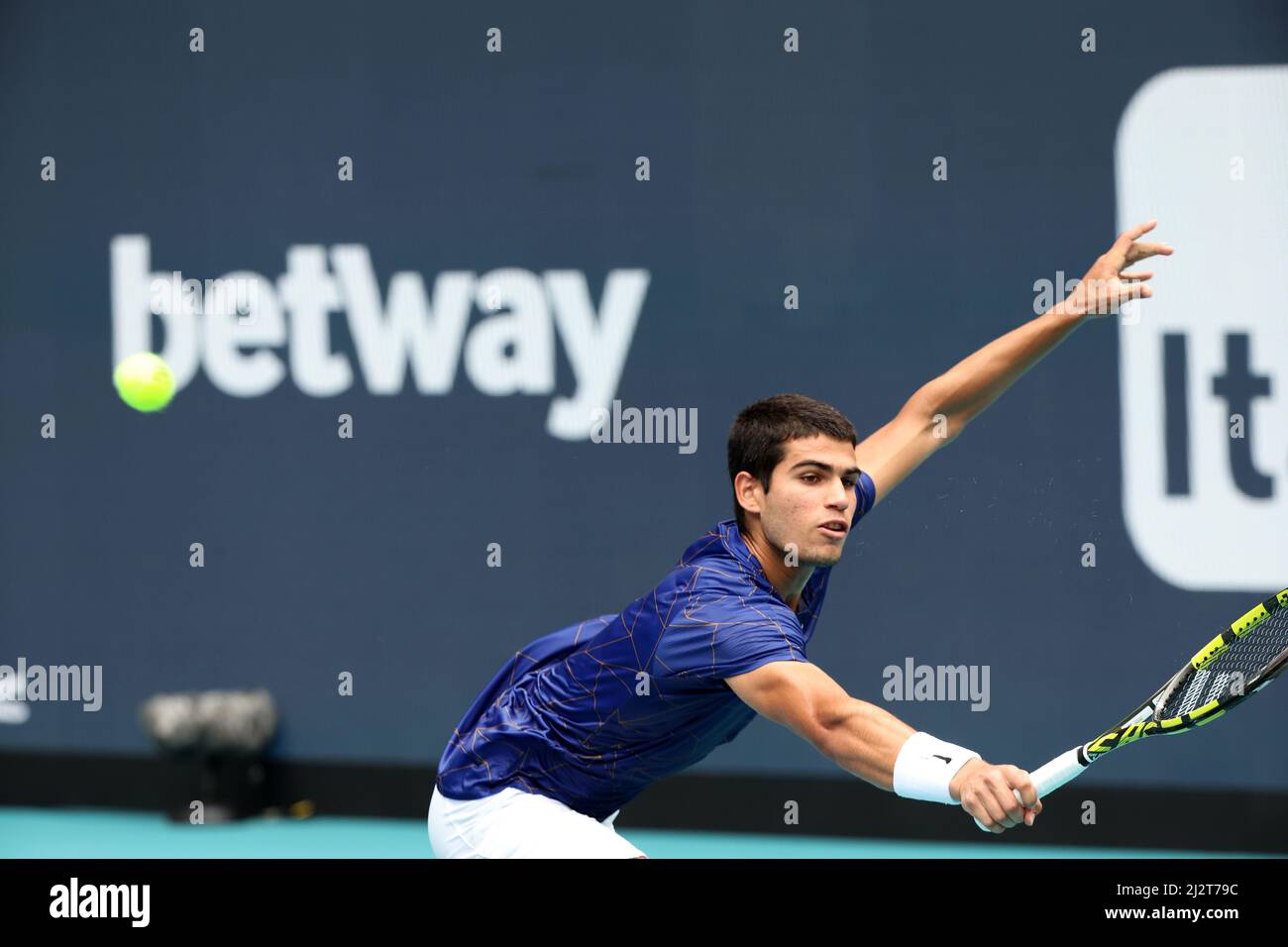 Miami Gardens, Florida, USA. Miami Gardens, Florida, USA. 03rd Apr, 2022. Carlos Alcaraz of Spain makes history as the first spaniard and youngest player to win the Miami Open. The 18-year-old claimed his first ATP Masters 1000 title with a straight-set victory over Casper Ruud of Norway in the men's final of the Miami Open at the Hard Rock Stadium on April 03, 2022 in Miami Gardens, Florida. People: Carlos Alcaraz Garfia Credit: Hoo Me/Media Punch/Alamy Live News Credit: MediaPunch Inc/Alamy Live News Stock Photo