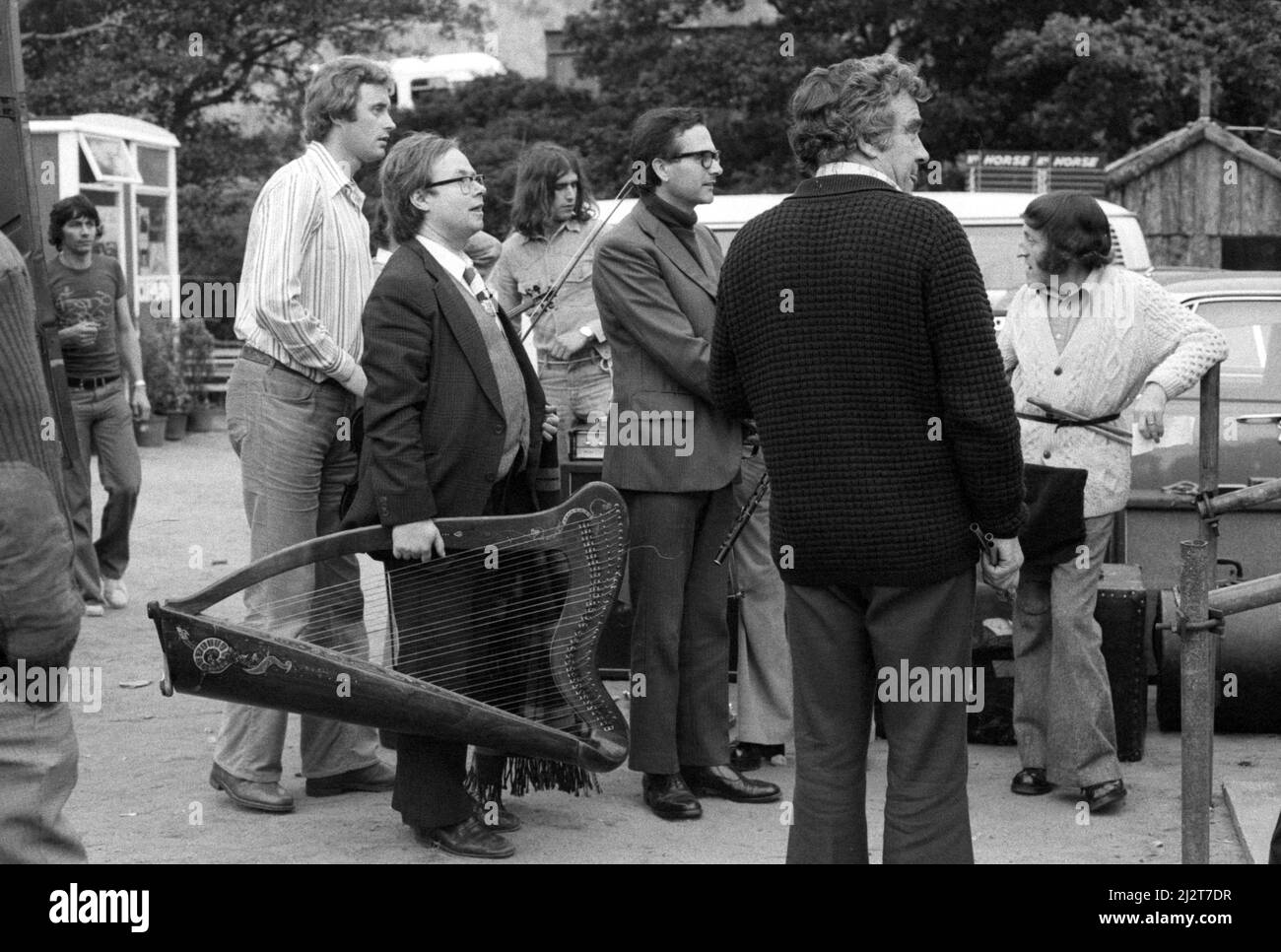 Irish folk band The Chieftains waiting to go on stage at the July Wakes folk festival in Chorley, Lancashire, England on 25 July 1976. Stock Photo