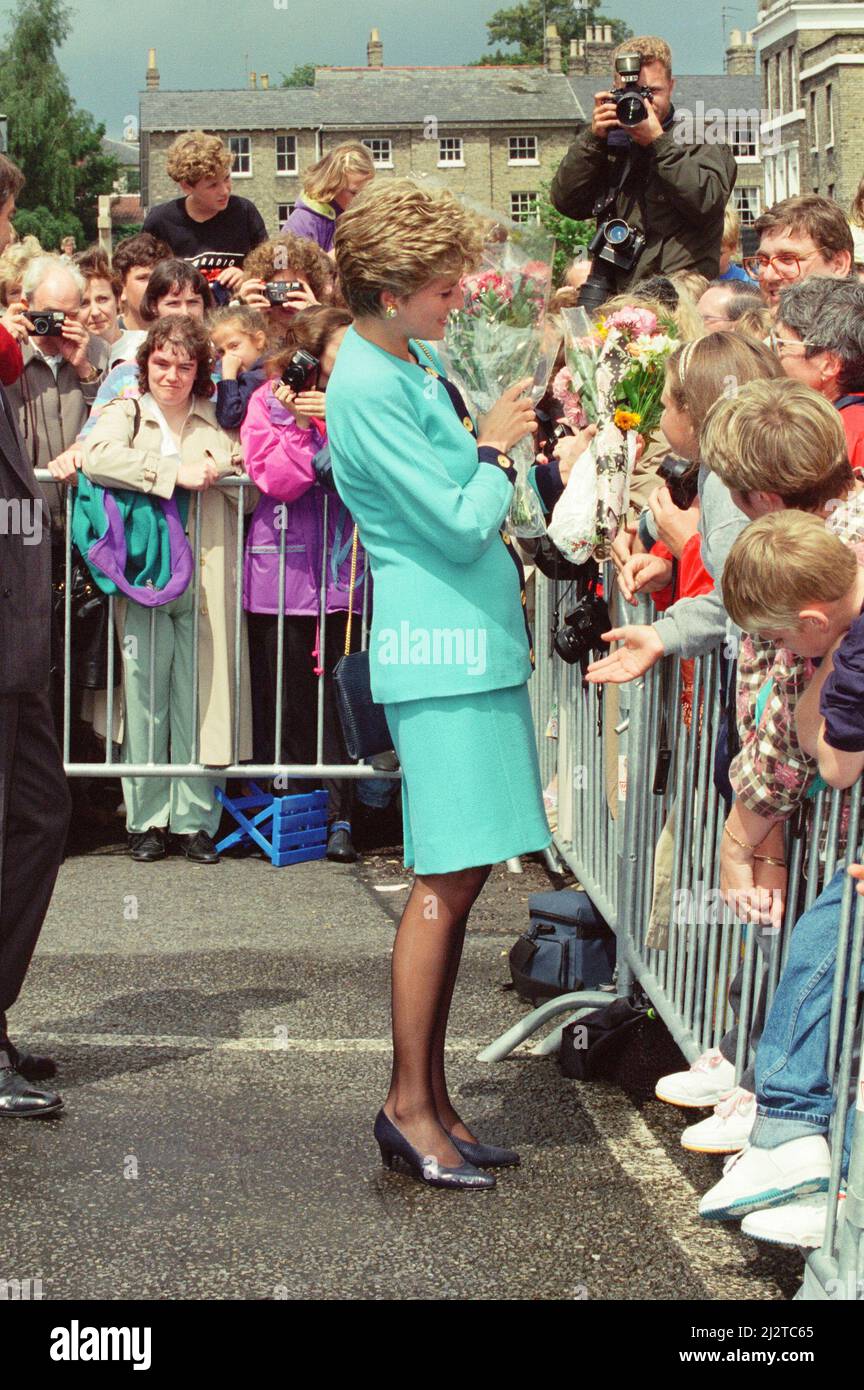 HRH The Princess of Wales, Princess Diana, meets to locals of Bury St Edmunds, Suffolk, on a walkabout after she'd spent time visiting patients at St Nicholas hospice.Whilst at the hospice she spoke with patient Josephine Brown (68) and explained how she would not pressure her sons William and Harry into doing royal duties too young.  Picture taken 27th July 1993 Stock Photo