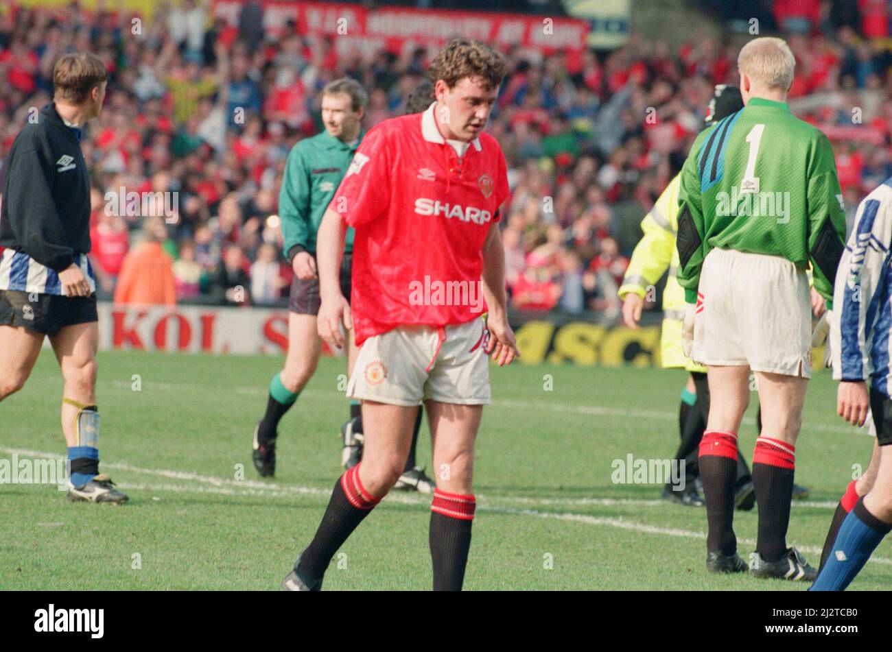 Steve Bruce, pictured at the end of the match, after scoring the 96th minute winner for Manchester Unitedagainst Sheffield Wednesday at Old Trafford.  Final Score was Manchester United - 2  Sheffield Wednesday  - 1  Manchester United went on to win the Premiership 1992/1993 season.  Picture taken 10th April 1993 Stock Photo