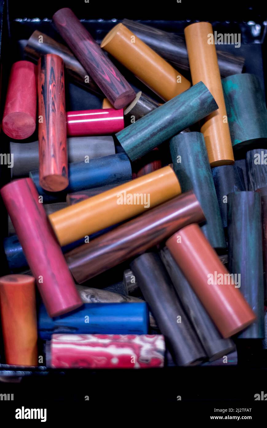 These colorful pieces of wood are called pipe blanks, and they are used