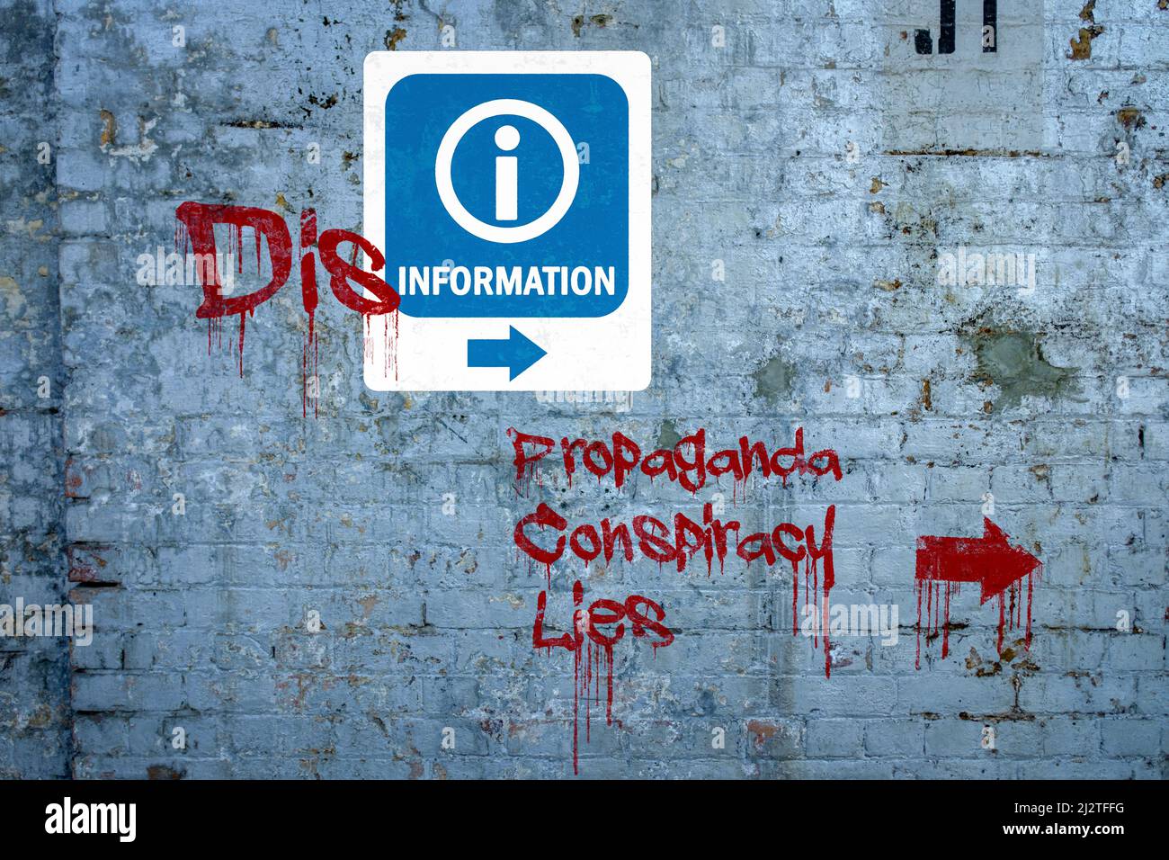 Disinformation graffiti on information sign, propaganda, conspiracy, lies spray painted on wall, misinformation, fake news concept. Stock Photo
