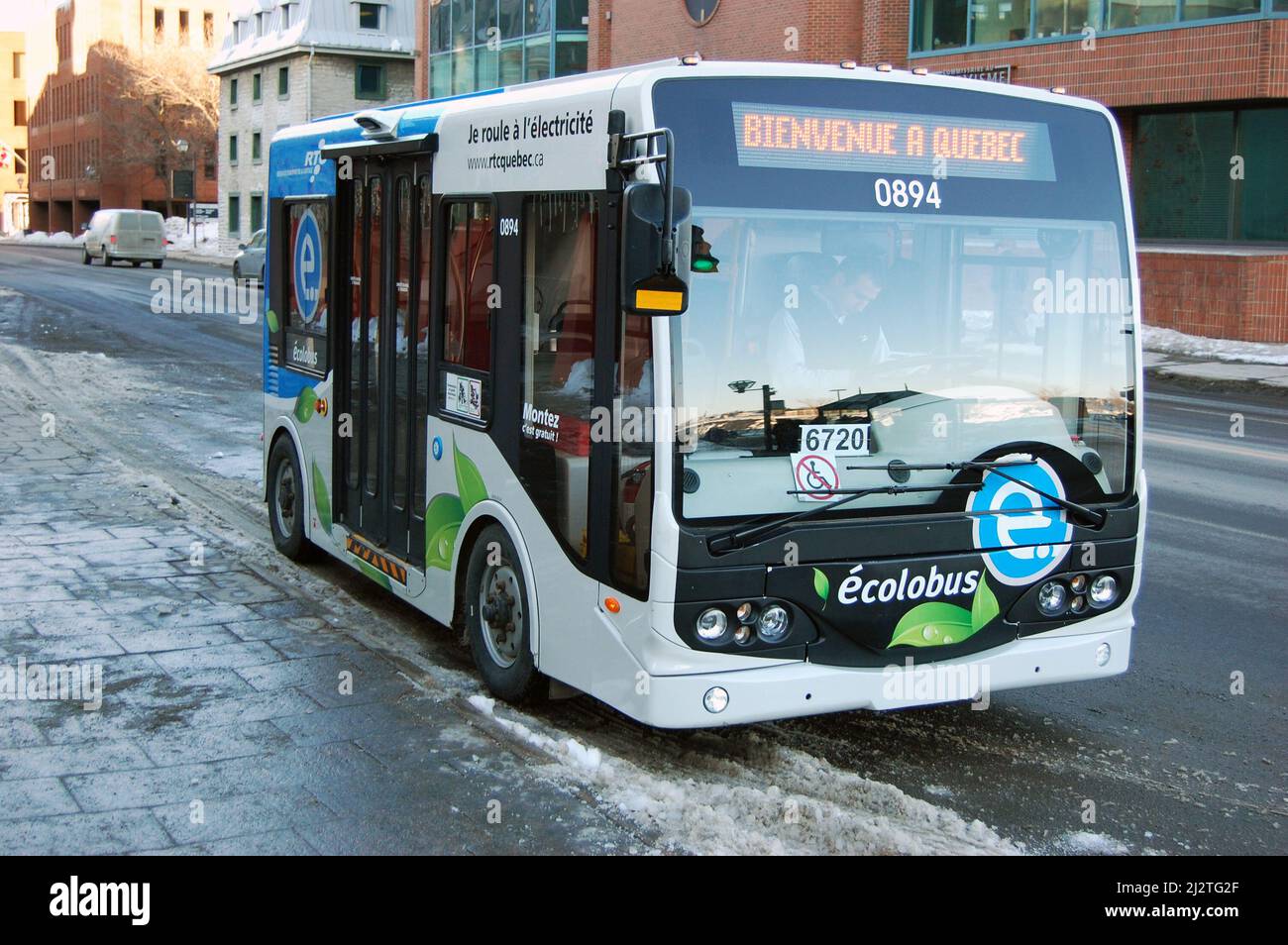 Free electric mini bus ecolobus in historic Quebec City, QC, Canada. Historic city center of Quebec City is a UNESCO World Heritage Site. Stock Photo