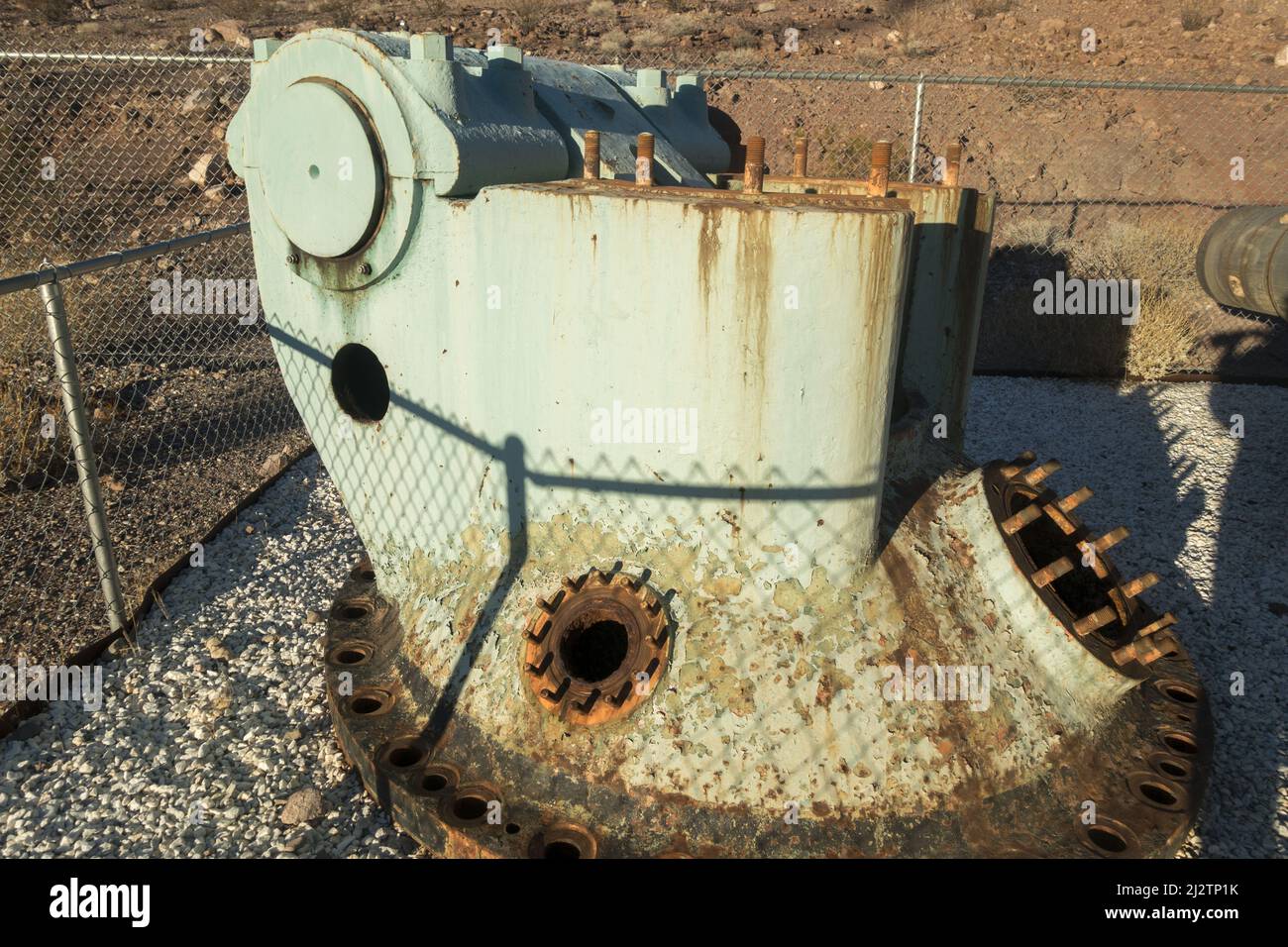 Old Rusted Hydroelectric Equipment on Historic Railroad Hiking Trail Bone Yard, used for Famous Hoover Dam Construction on US Arizona - Nevada Border, Stock Photo