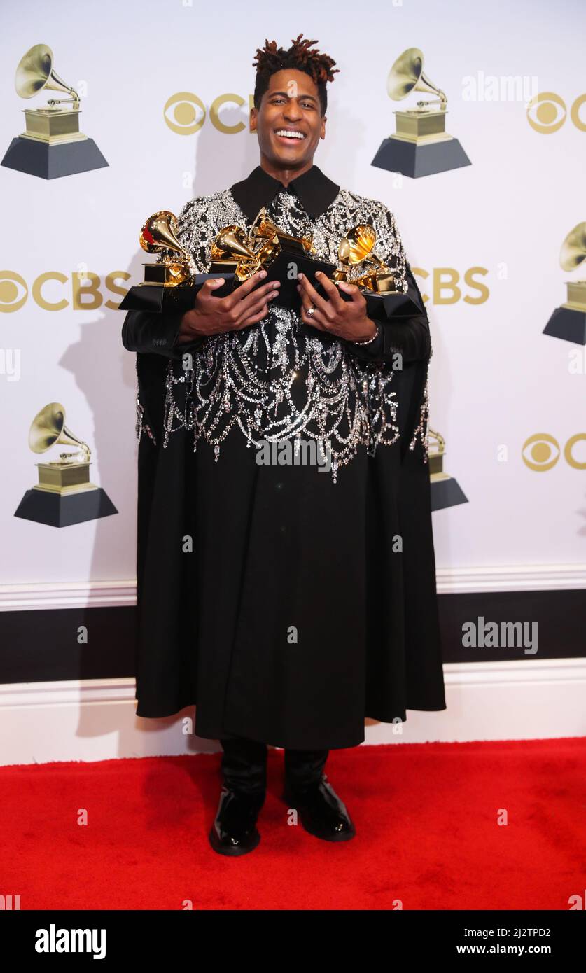 Jon Batiste poses with their Grammys for Best American Roots Performance for 'Cry,' Album of the year for “We Are,” Best American roots song,  Best music video and Best score soundtrack for visual media for “Soul,' at the 64th Annual Grammy Awards at the MGM Grand Garden Arena in Las Vegas, Nevada, U.S., April 3, 2022. REUTERS/Steve Marcus Stock Photo