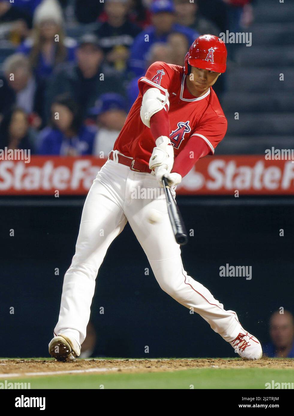 Shohei Ohtani of the Los Angeles Angels hits a solo home run in