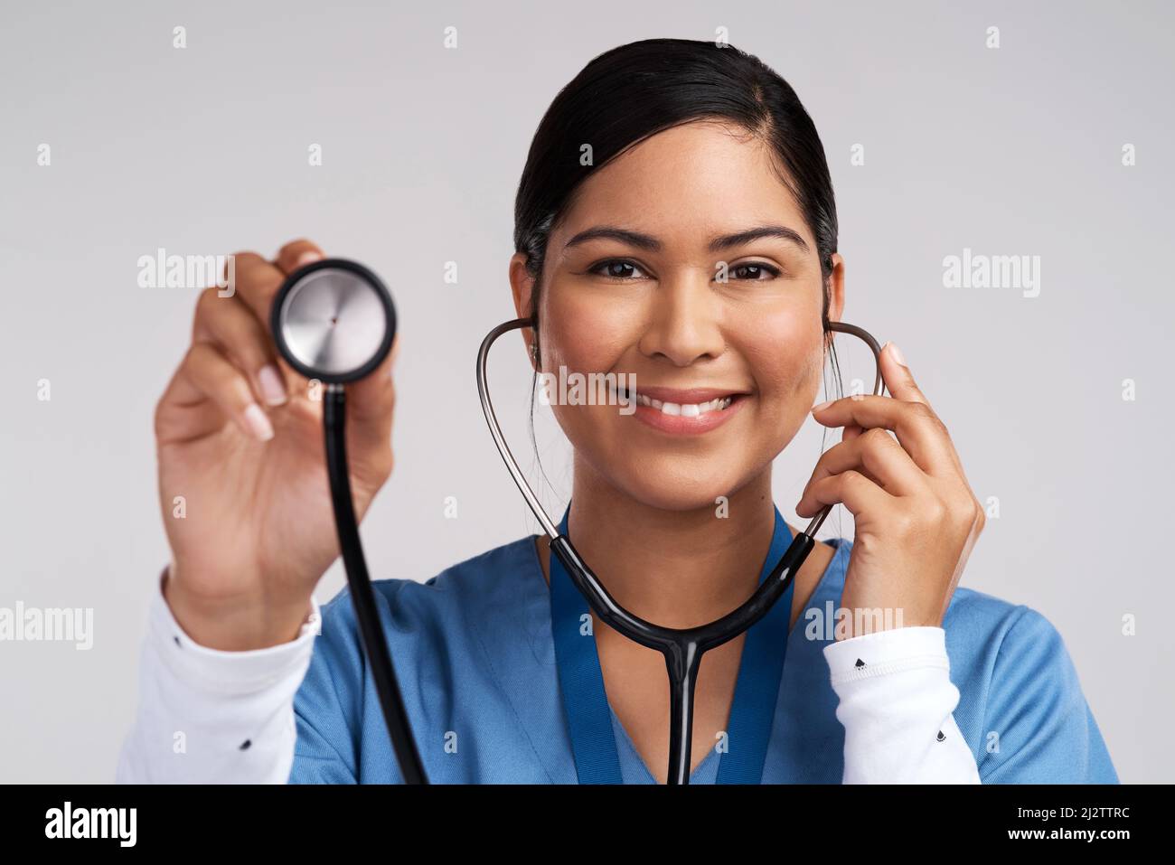 Doctor using a stethoscope hi-res stock photography and images - Alamy
