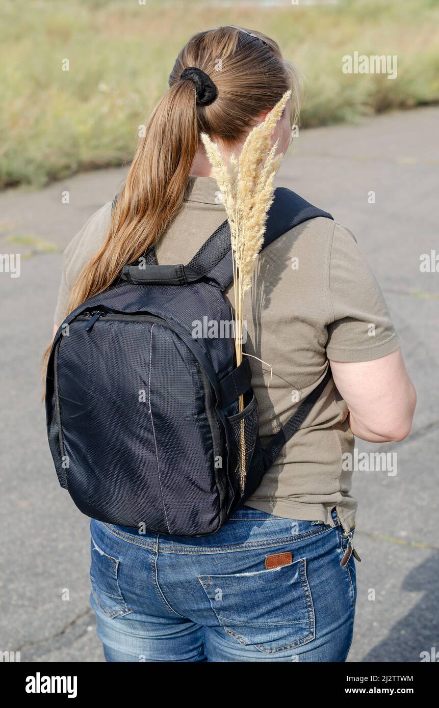 Back view woman black jeans hi-res stock photography and images - Alamy