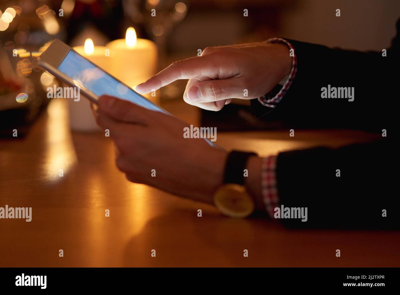 Day and night connections. Shot of an unrecognizable businessman using a digital tablet. Stock Photo