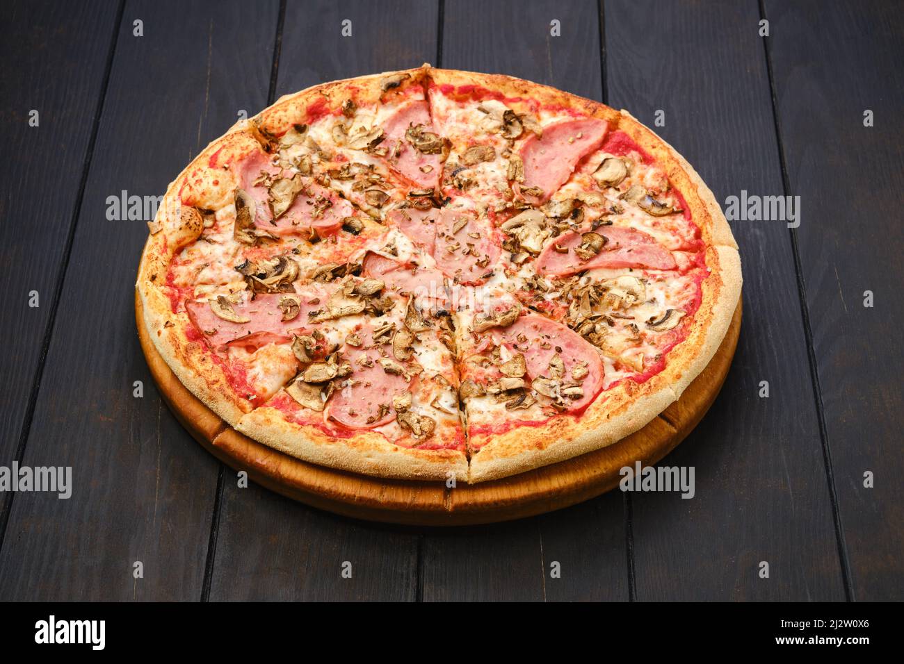 Pizza with beef ham, champignon mushrooms and tomato Stock Photo Alamy