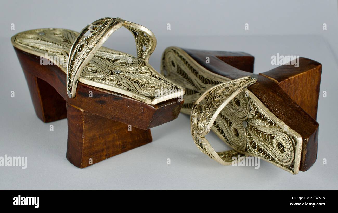 Silver decorated high slippers used in the hot baths of the Ottomans and Turks. Clog. Gift, cultural object. Dowry item decorated with precious silver Stock Photo
