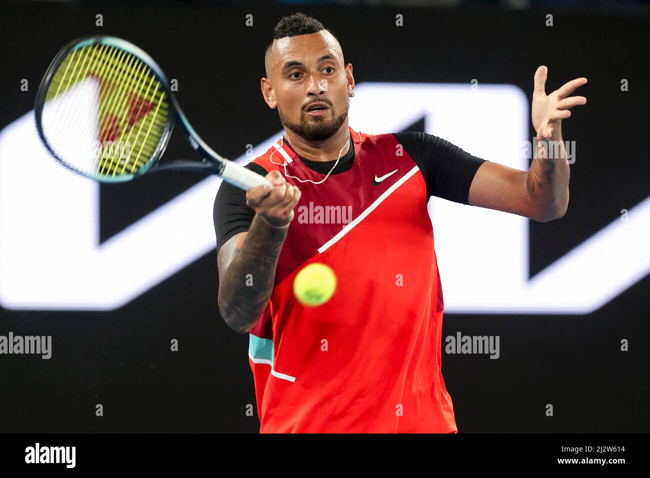 Australian tennis player Nick Kyrgios playing forehand shot at