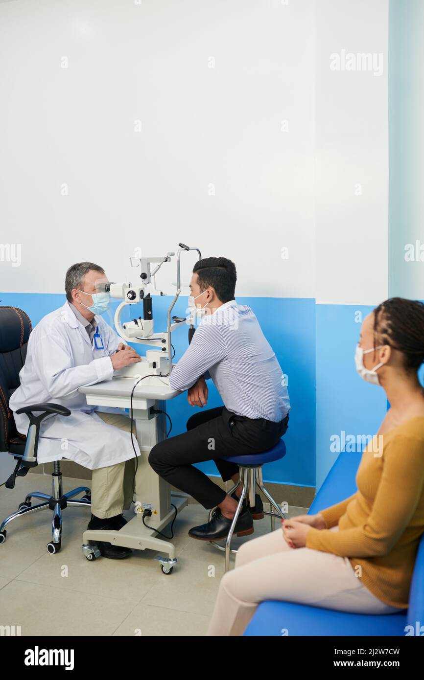 Patients getting eyes tests in modern medical clinic Stock Photo Alamy