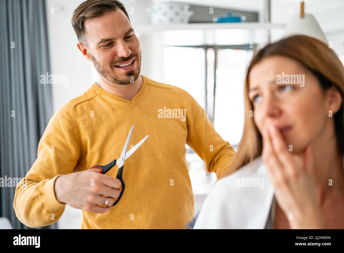 Cutting hair self hi-res stock photography and images - Alamy