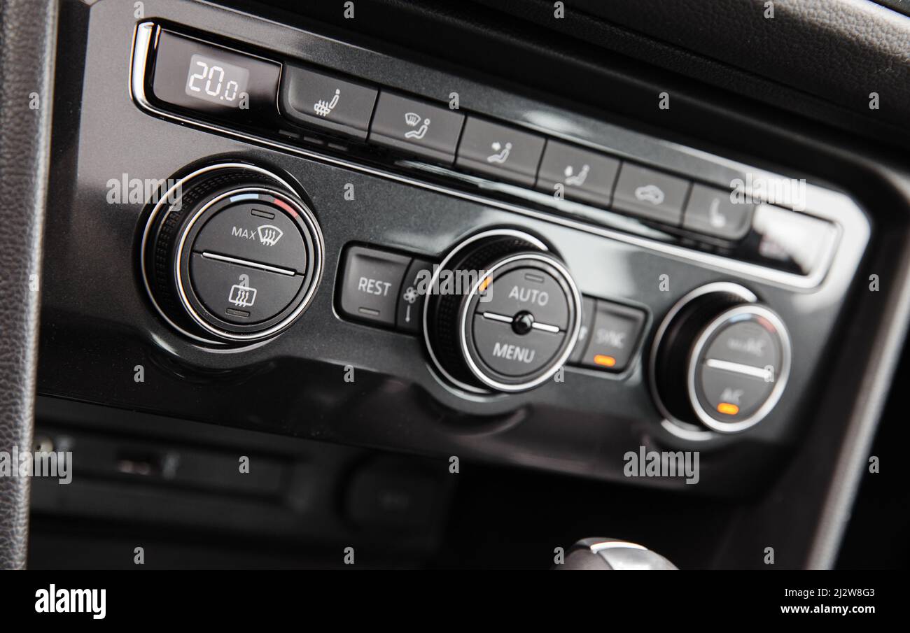 Climate control panel of modern luxury crossover car. Close up photo with selective focus Stock Photo