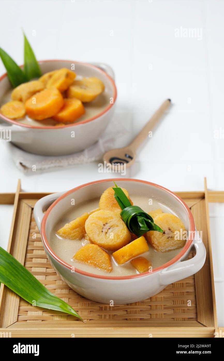 Kolak Pisang Ubi, Banana and Sweet Potato Compote, Popular Food Beverages for Iftar. Kolak Made from Coconut Milk and Palm Sugar with Various Ingredie Stock Photo