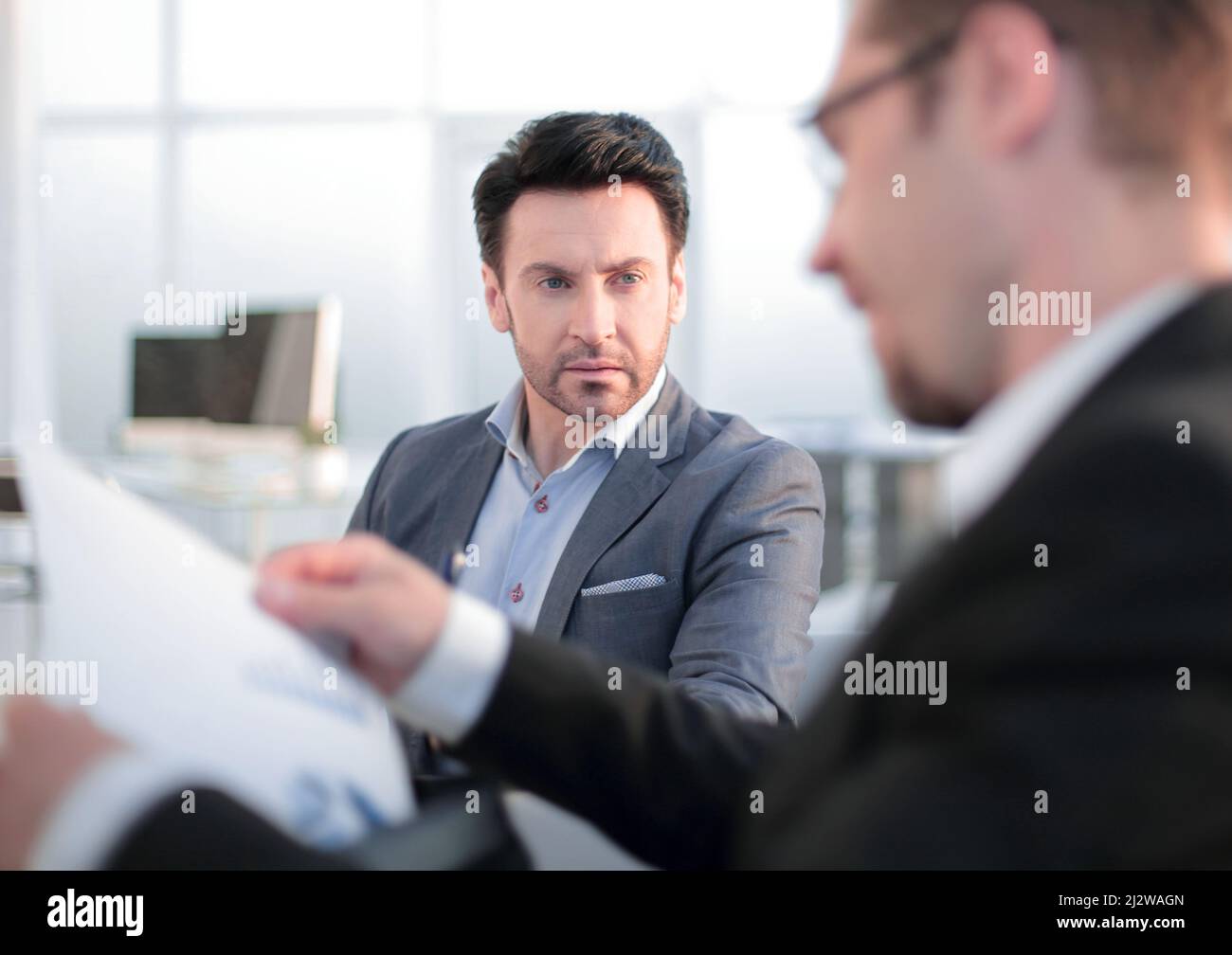 close up. two employees discussing business documents Stock Photo