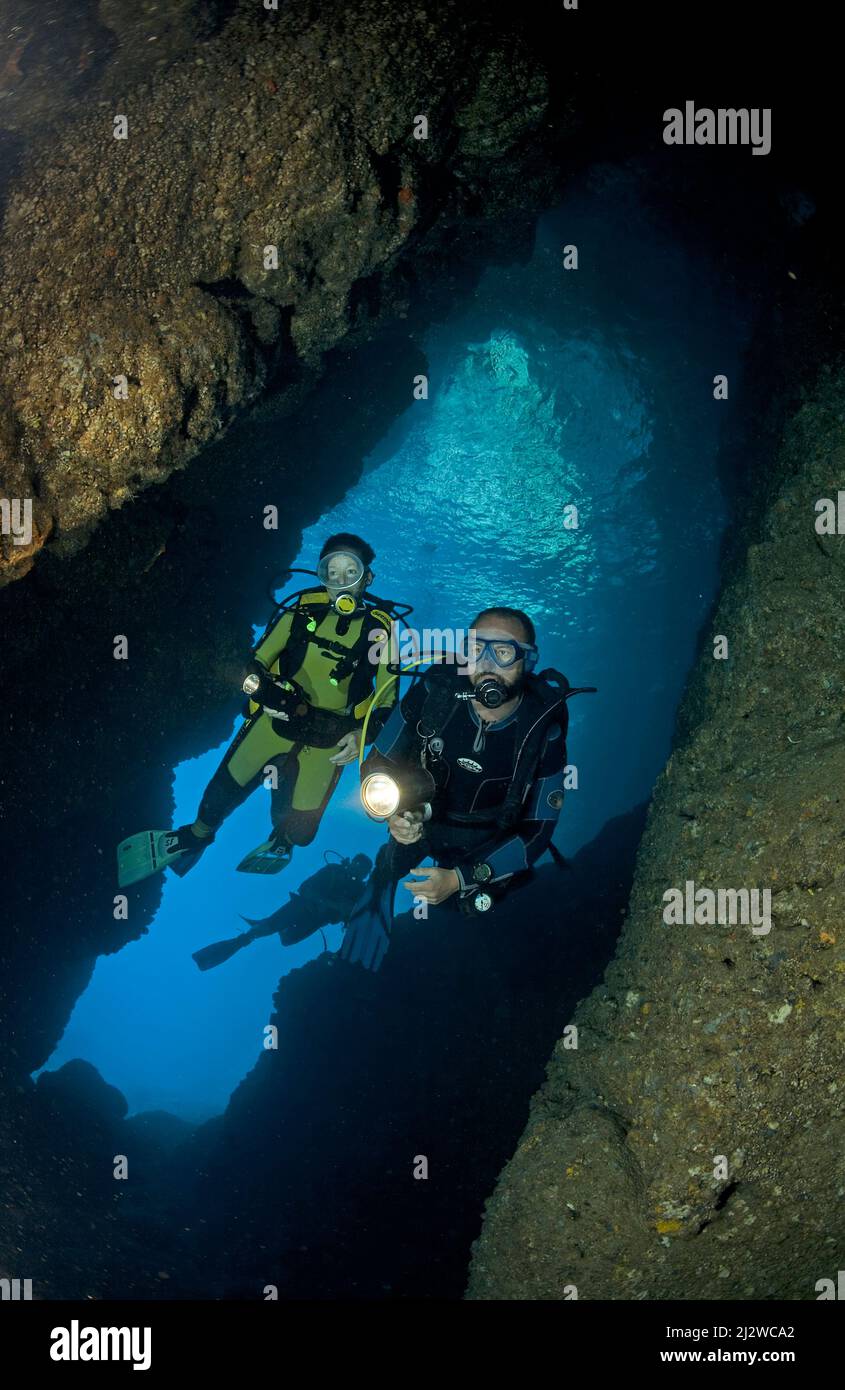 Scuba diver in a underwater cave, Adrasan, Lykia, Turkey, Mediteranean sea Stock Photo