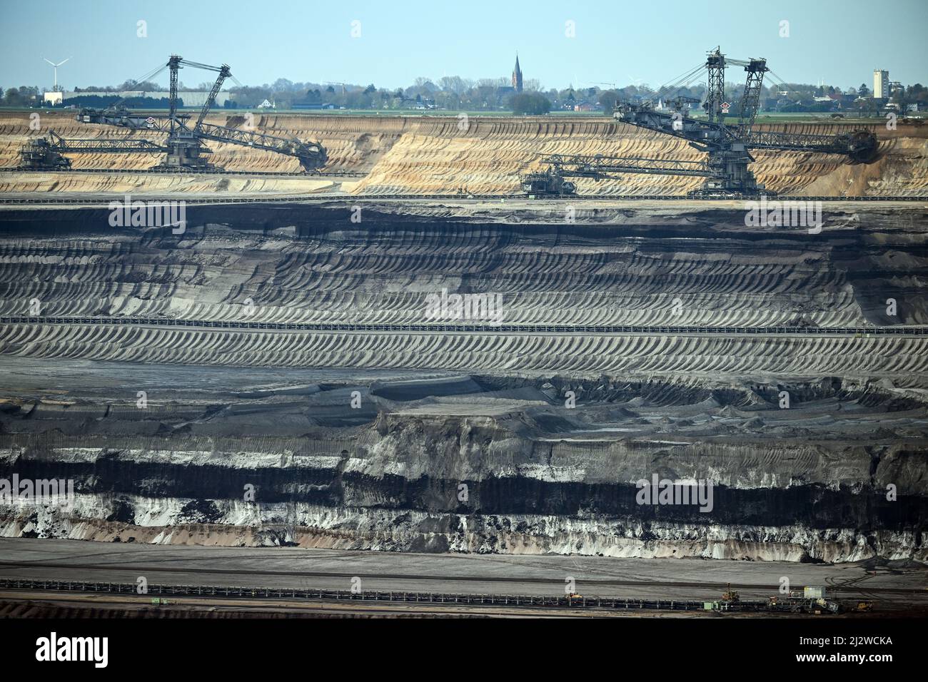 Jackerath, Germany. 04th Apr, 2022. Mining machines work in the Garzweiler open pit lignite mine. The Intergovernmental Panel on Climate Change will today present a comprehensive overview of how man-made climate change can be limited. The report reflects the current state of research on what measures are necessary and effective to curb global warming and avert climate catastrophe. Credit: Federico Gambarini/dpa/Alamy Live News Stock Photo