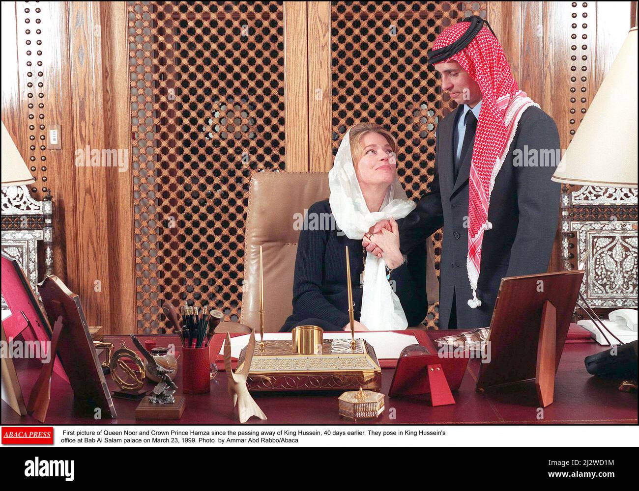 File photo - First picture of Queen Noor and Crown Prince Hamza since the passing away of King Hussein, 40 days earlier. They pose in King Hussein's office at Bab Al Salam palace on March 23, 1999. Prince Hamzah bin Hussein, the former heir to the throne of Jordan, has said he is renouncing his title of prince. Prince Hamzah said his 'personal convictions' were not in line with the 'modern methods of our institutions'. The prince is the fourth son of the late King Hussein and younger half-brother of the ruling King Abdullah. He was put under house arrest last year after accusing the country's Stock Photo