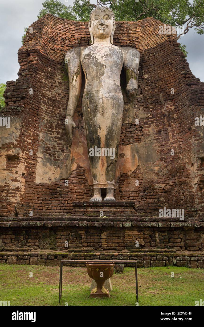 Standing Buddha at Wat Phra Si Iriyabot, Kamphaeng Phet, Thailand. Stock Photo