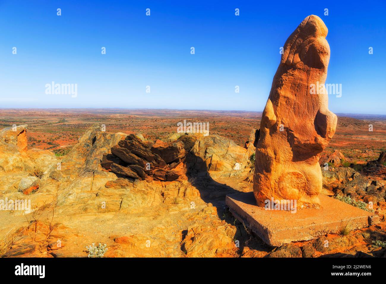 Stone mason rock sculpture on the cliffs and rocks in public park near