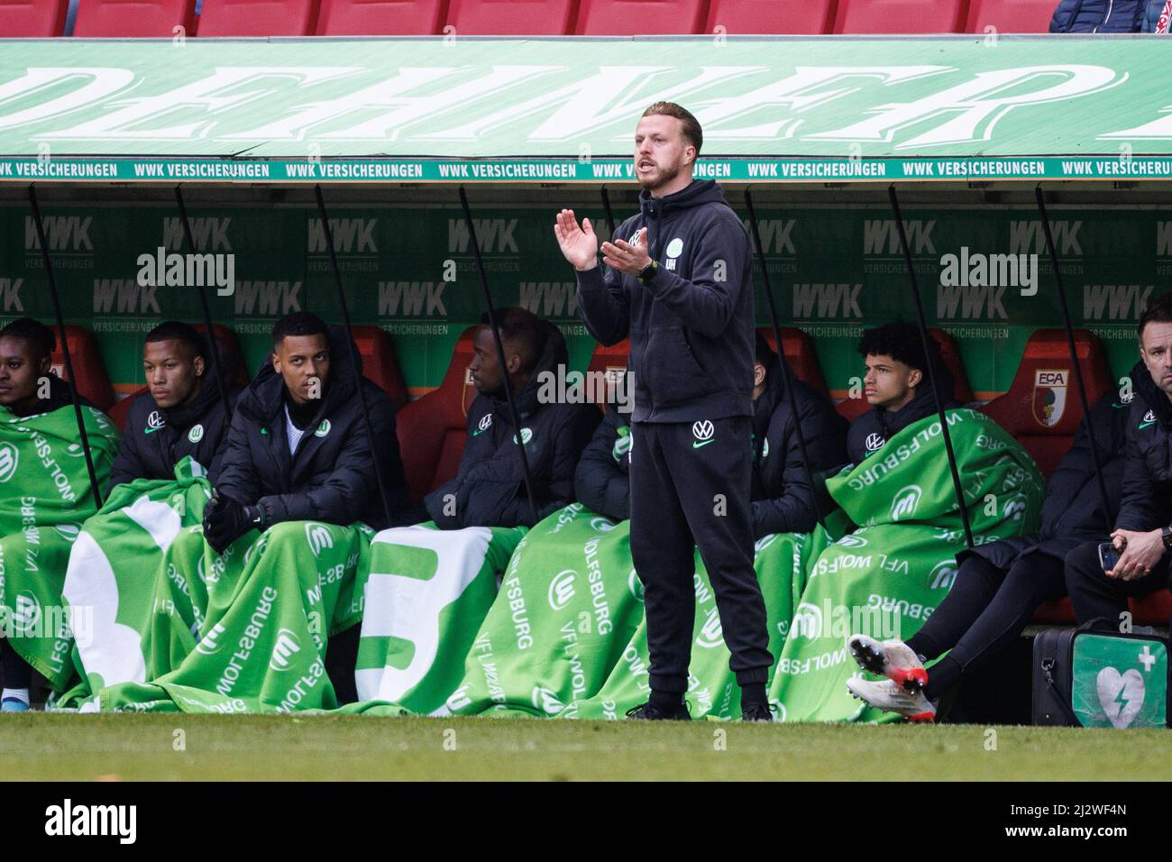 Augsburg, Germany. 03rd Apr, 2022. Soccer: Bundesliga, FC Augsburg - VfL Wolfsburg, Matchday 28, WWK Arena. Vincent Heilmann of VfL Wolfsburg stands on the sidelines. Credit: Matthias Balk/dpa - IMPORTANT NOTE: In accordance with the requirements of the DFL Deutsche Fußball Liga and the DFB Deutscher Fußball-Bund, it is prohibited to use or have used photographs taken in the stadium and/or of the match in the form of sequence pictures and/or video-like photo series./dpa/Alamy Live News Stock Photo