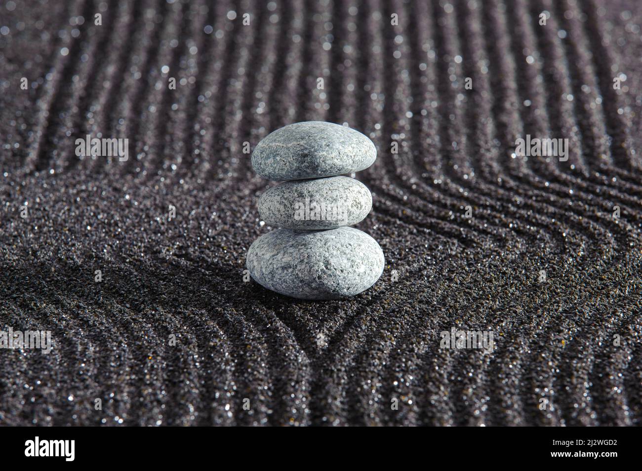 Japanese zen garden with yin and yang and feng shui in textured sand ...