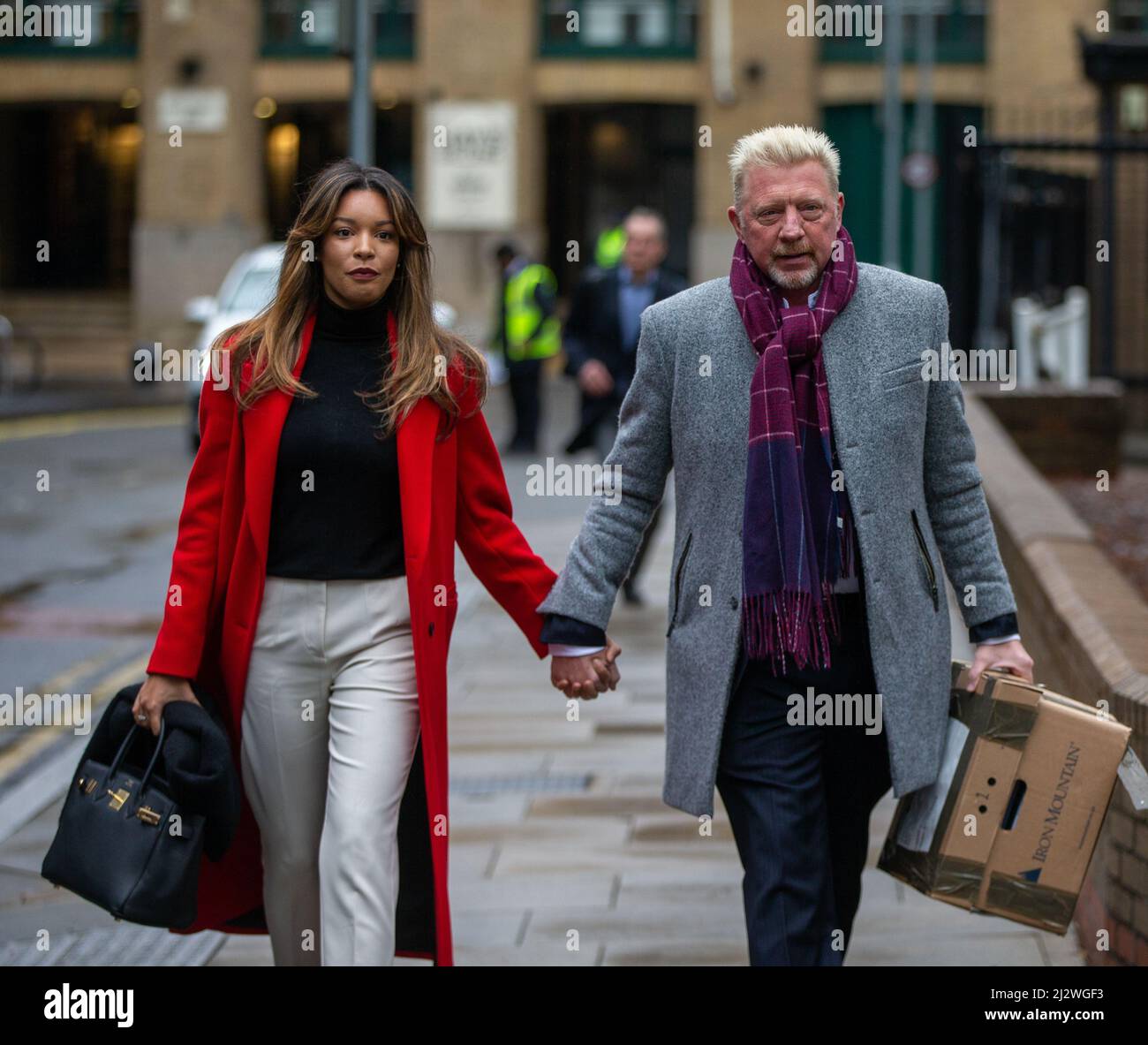 London, England, UK. 4th Apr, 2022. Former German tennis star BORIS BECKER and his partner LILIAN DE CARVALHO MONTEIRO arrive at Southwark Crown Court in London where he is being prosecuted by the Insolvency Service for not complying with obligations to disclose information after being declared bankrupt. (Credit Image: © Tayfun Salci/ZUMA Press Wire) Stock Photo