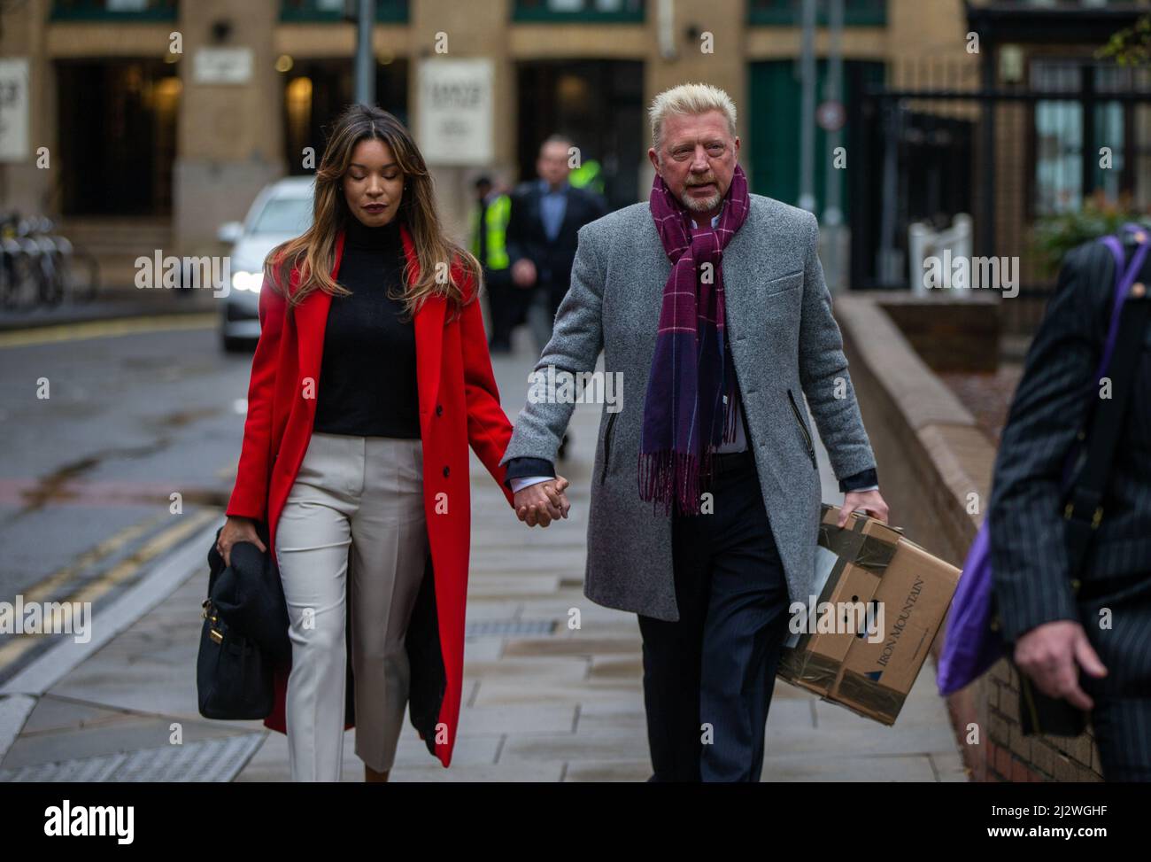 London, England, UK. 4th Apr, 2022. Former German tennis star BORIS BECKER and his partner LILIAN DE CARVALHO MONTEIRO arrive at Southwark Crown Court in London where he is being prosecuted by the Insolvency Service for not complying with obligations to disclose information after being declared bankrupt. (Credit Image: © Tayfun Salci/ZUMA Press Wire) Stock Photo
