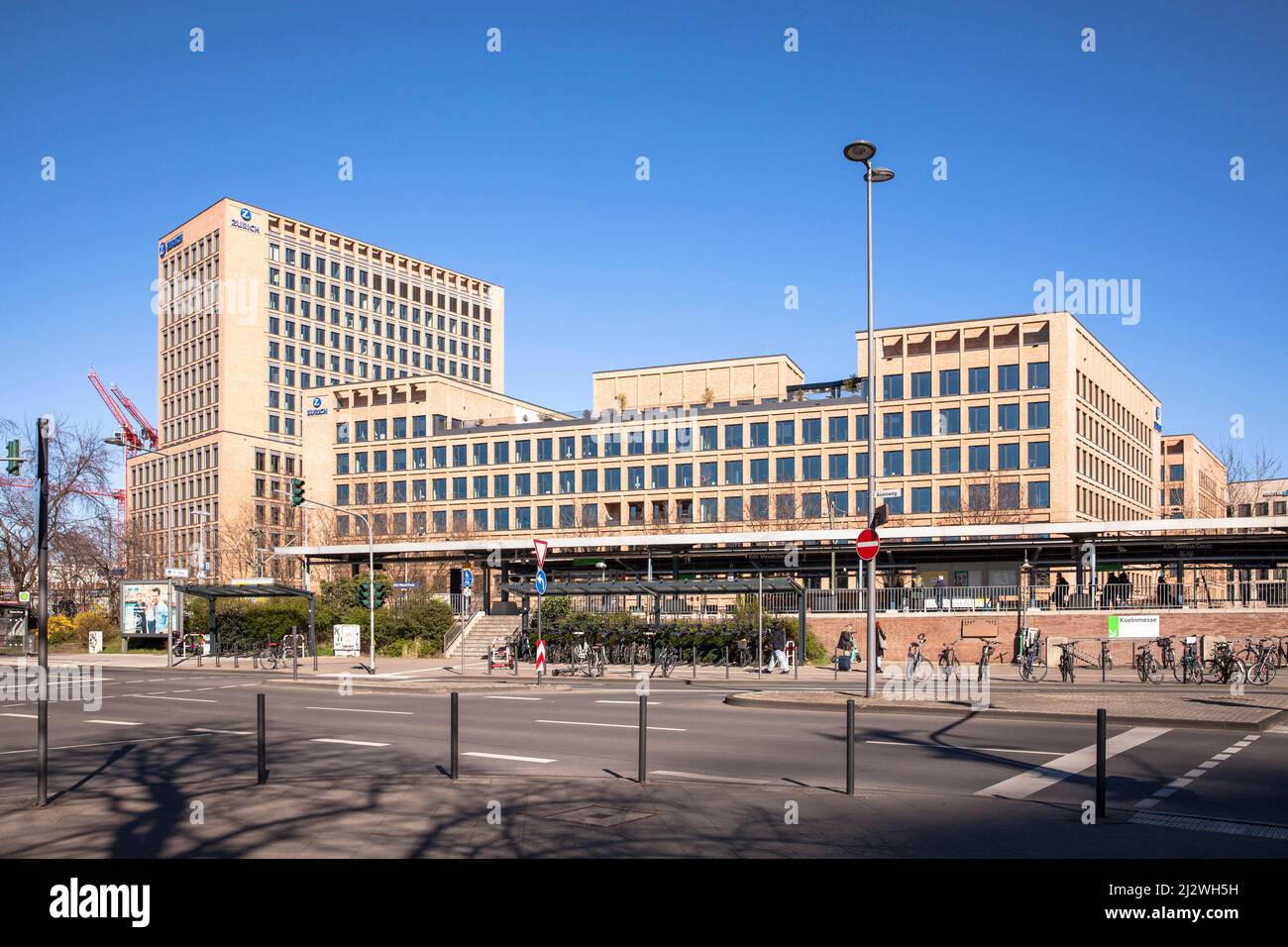 the building of the Zurich Insurance Company in the MesseCity in the district Deutz, in front of it a platform of the station Deutz and the street Aue Stock Photo