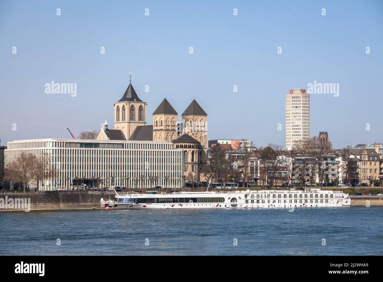 view over the river Rhine to the Institut der deutschen Wirtschaft Koeln or Cologne Institute for Economic Research at the street Konrad-Adenauer-Ufer Stock Photo