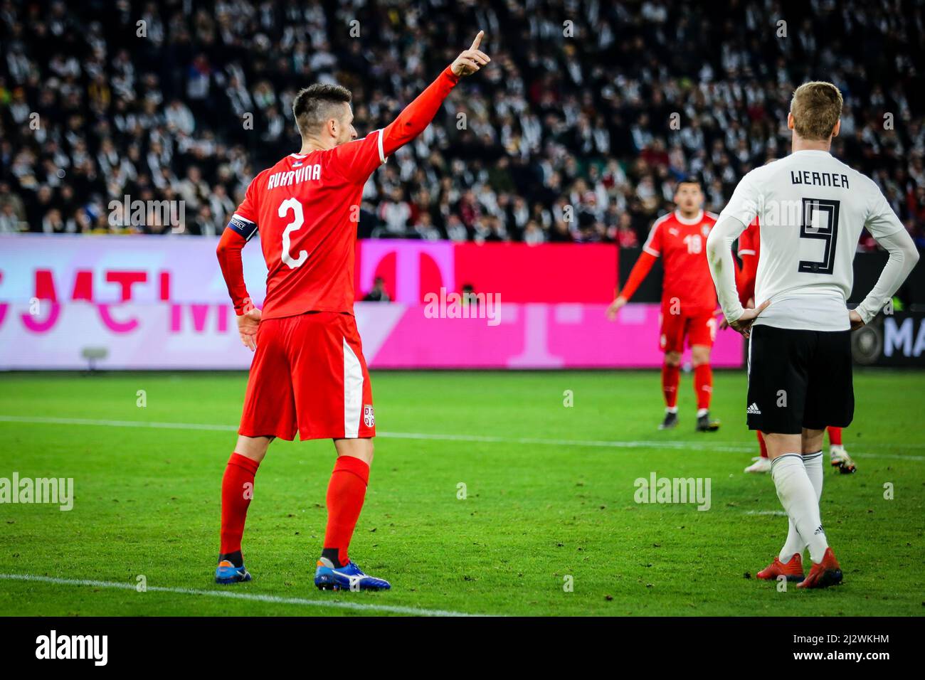 Wolfsburg, Germany, March 20, 2019: Serbian national team captain Antonio Rukavina directs his teammates during the international friendly game Stock Photo